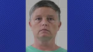 'I was scared for my life': Perry local charged after pointing gun at  woman, child over parking spot