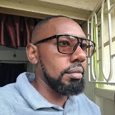 On your way to mai mahiu town from limuru, down the escarpment there is  this guy with one of the curio shops at the view point, Njihia Harùni  Karanja a good follower