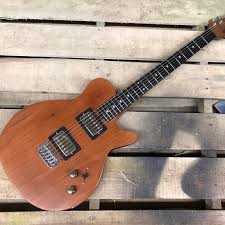 Custom Les Bois from last year. We built this body out of a tree from the  customers backyard, and added this killer roasted Birdseye neck along with ebony  board and pickup rings