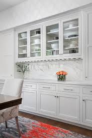 An amazing kitchen with a rolling ladder to access high cabinets as well as a stunning 10 by 4 foot carrara marble topped island! Built In Hutch Design Ideas