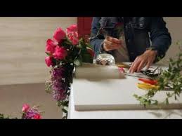 We used calla lilies for this look but you can use your favorite faux flower with a bendable stem. How To Make A Cascading Bridal Bouquet With Roses Orchids And Calla Lilies Youtube Cascading Wedding Bouquets Diy Wedding Bouquet Flower Bouquet Wedding