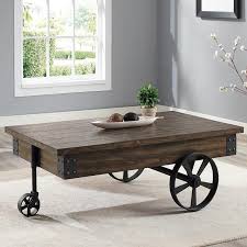 Absolutely in love with this coffee table!! Crown Mark Occasional Tables Otis 4238 01 Wagon Wheel Coffee Table Coffee Tables From Eddins Furniture