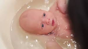 According to the american academy of pediatrics, three times a week is fine as long as you clean their face, neck. Baby Bath Stock Video Footage Royalty Free Baby Bath Videos Page 5