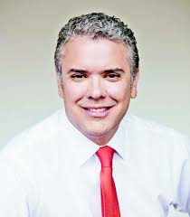 Membre du parti de droite radicale centre démocratique et proche d'álvaro uribe, il est président de la république depuis le 7 août 2018. 2018 Presidential Candidates Colombia Race Preview