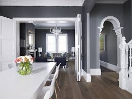 Thinking About The Grey Paint For Our Hallway With The White Trim And Black Doors Home House Interior Grey Wall Color