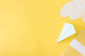 Download Paper Plane And Brain With Diary On Yellow For Free Paper Plane Artist Workspace Paint Background