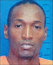 Murder suspect at large