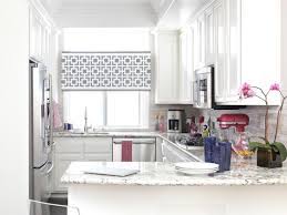 The modern twist on tradition is a frameless window over the sink that overlooks a green backyard or swimming pool. Small Kitchen Window Treatments Hgtv Pictures Ideas Hgtv