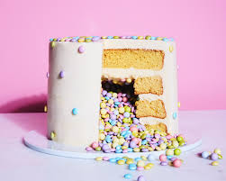 Decorating a cake with candy. How To Make A Surprise Cake Epicurious