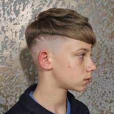 A cool hairstyle for boys with medium to long hair, the samurai bun style is easy to achieve. Nice Blonde Boys Haircuts Novocom Top