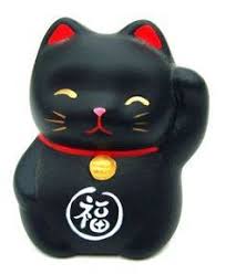 'beckoning cat') is a common japanese figurine which is often believed to bring good luck to the owner. Black Lucky Cat With The Raised Paw Aka Fortune Cats Or Maneki Neko In Japanese Culture Bring Good Luck Wealth And Prosper Maneki Neko Lucky Cat Neko Cat
