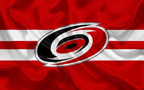 The hurricanes' primary logo has always been a stylized hurricane with a storm warning flag on a hockey stick as the secondary logo. Carolina Hurricanes Hockey Club Nhl Emblem Logo North Carolina Hurricanes Logo 710x444 Download Hd Wallpaper Wallpapertip