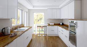 Cette kitchenette bien pensée mise sur l'opposition entre éléments bas en. 1001 Modeles Fascinants Du Duo Cuisine Blanche Plan De Travail Bois
