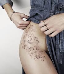Choosing hip tattoos can be a bit of a challenge for some people since they want to find designs that work with their natural curves. Floral Hip Best Tattoo Ideas For Men Women