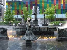 More than 100 montreal firefighters were called to fight the blaze that caught onto neighbouring watch above: Publicart Fountains Firefighters Fountains Fountain Public Art