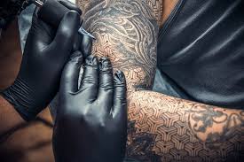 A tattoo that wraps around like a bracelet. Tattoo Pain Chart 101 How Bad Do Tattoos Hurt