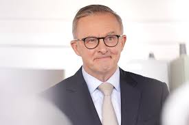 Albanese tries to 'shake it off', as a neon orange Morrison hits the  manufacturing floor