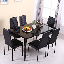 The contemporary inez has a durable seat frame and exquisite faux leather upholstered seat and back. Glass Dining Table And Set Of 6 Faux Leather Dining Chairs Living And Home