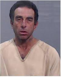 Man accused of wielding scissors during robbery