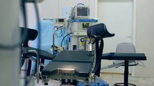 Close Up Of A Gynecological Examination Chair In A Medical Room Stock Footage Examination Chair Close Gynecological Medical Layout Design Radiation Treatment