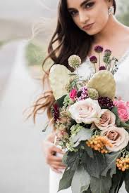 Orange ranunculus and anthurium floral centerpieces in terra cotta vessels. 120 Bouquets Cactus And Succulents Ideas Succulent Bouquet Bridal Bouquet Bouquet