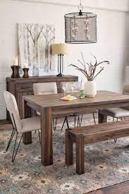 A dining room table is more than a place to eat, it's a place where friends and family gather. White Dining Room With Rustic Table Bench And Sideboard Candleier Rustic Table And Chairs Dining Table With Bench Rustic Dining Room Sets