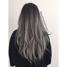 Darker hues are added in the front to hide prominent features and focus on the eyes and lips. Grey Ombre Hair Color What S New