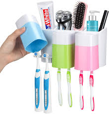 If you do, the toothbrush, its electrical components and batteries will just sit in a landfill. Amazon Com Ihave Toothbrush Holder Wall Mounted With Large Capacity Easy Install Durable Kids Family Set Electric Toothbrush Holder For Bathroom 3cups Kitchen Dining