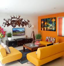 The cozy living room in black and white themes features a white table on the black and white pattern carpet that matches black and white wall decor. 75 Beautiful Living Room With Orange Walls Pictures Ideas June 2021 Houzz