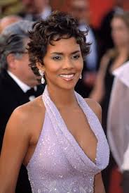 Halle berry's curly long ringlet suits her best. Halle Berry S Hairstyles Over The Years