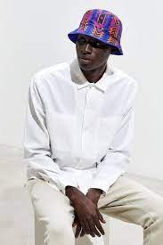 The North Face 92 Rage Sun Stash Reversible Bucket Hat In 2021 The North Face Retro Vibe Bright Patterns