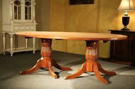 This fresh new take on the classic farmhouse design is constructed from solid mahogany in a rich brown. Large Oval Dining Table With 2 Fluted Pedestals Ecustomfinishes