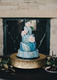 5 Expert Tips For Saving The Top Tier Of Your Wedding Cake Brides Com Modern Wedding Cake Wedding Cakes Blue Gold Wedding Cake