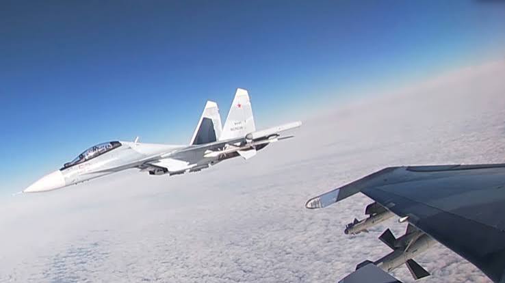 Russian fighter jets conducting aerial maneuvers during a recent live-fire drill in Central Europe.