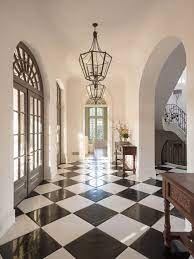 Large black and white floor tiles. Large Spacious Entryway With Archways And White And Black Tiled Floor Bradley E Heppner Black And White Flooring Large Hallway Foyer Flooring