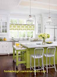 For contrast, she chose an emerald green tone from the wallpaper to paint the kitchen's island. Fresh Kitchen Decor Ideas Home Design Decor Home Decor Design