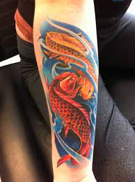 Pieces Two Koi Fish Red And Orange Symbolize Mother Cover Up Wrist Tattoo Capital Tattoo Edmonton Albert Tattoos Koi Fish Tattoo Japanese Koi Fish Tattoo