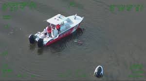 two rescued from sinking jet ski near