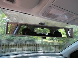 It's distracting to me to have 2 rear view mirrors. Inexpensive No Blind Spot Rearview Mirror Boing Boing