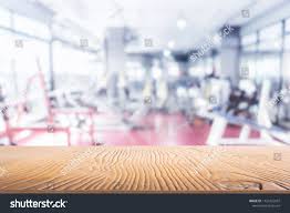 Maybe you would like to learn more about one of these? Empty Table Top With Blurred Gym Background Sport Exercise And Healthcare Concept Ad Sponsored Blurred Gym To Gym Background Stock Photos Photo Editing
