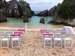 Gorgeous Ceremony Set Up On Jobson S Cove In Bermuda Planning Coordinating Destination Weddi Bermuda Wedding Wedding Locations Destination Wedding Locations