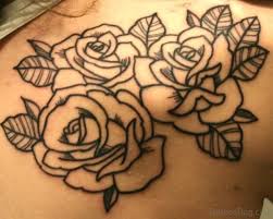 There are three roses, one large and the other two relatively small. 57 Pleasant Black Rose Tattoo Designs
