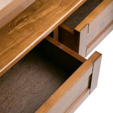 Sometimes an accent table is worth repeating behind a sofa or in an entryway. Simpli Home Warm Shaker Solid Wood 48 Inch Wide Rectangle Rustic Coffee Table In Light Golden Brown