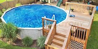 The top rails themselves all attach pretty much in the same the deck will be in the way when you need to take the pool apart to change the liner. Pool Deck Ideas Partial Deck The Pool Deck Plans Above Ground Pool Landscaping Pool Deck Decorations