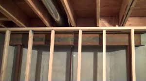 If you're building a wall in place, start by lining up the top and bottom plates and mark where the studs need to go. Gap Between Basement Wall And Ceiling Joist Mp4 Youtube
