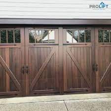 Pro Tip One Easy And Budget Friendly Way To Improve Your Home S Exterior Is With Stand Out Garage Doors Wooden Garage Doors Garage Door Styles Wooden Garage