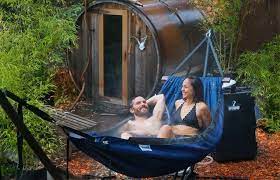 From picking the wood to choosing a heater, this guide walks you through the prep work for your diy sauna project. Somebody Created A Hot Tub Hammock For Two And It S Glorious Portable Hot Tub Outdoor Tub Diy Hot Tub