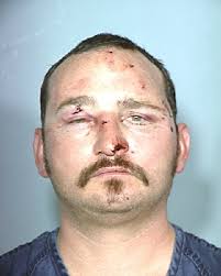 Man arrested after Sunday shooting near Cheyenne Avenue and Michael Way