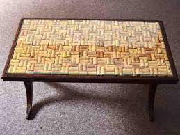 Display case meets coffee table. Wine Cork Crafts And Diy Decorating Projects Addicted 2 Decorating Wine Cork Table Wine Cork Diy Crafts Cork Crafts
