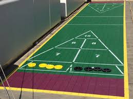 It is played on an outdoor court measuring 52 feet long by 10 feet wide, although there are different dimensions available on new portable and indoor courts. Shuffleboard Courts